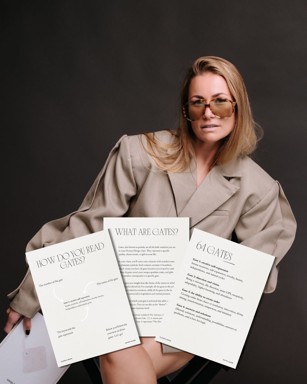 Clenda Moen with pages from the 64 Gates Guide