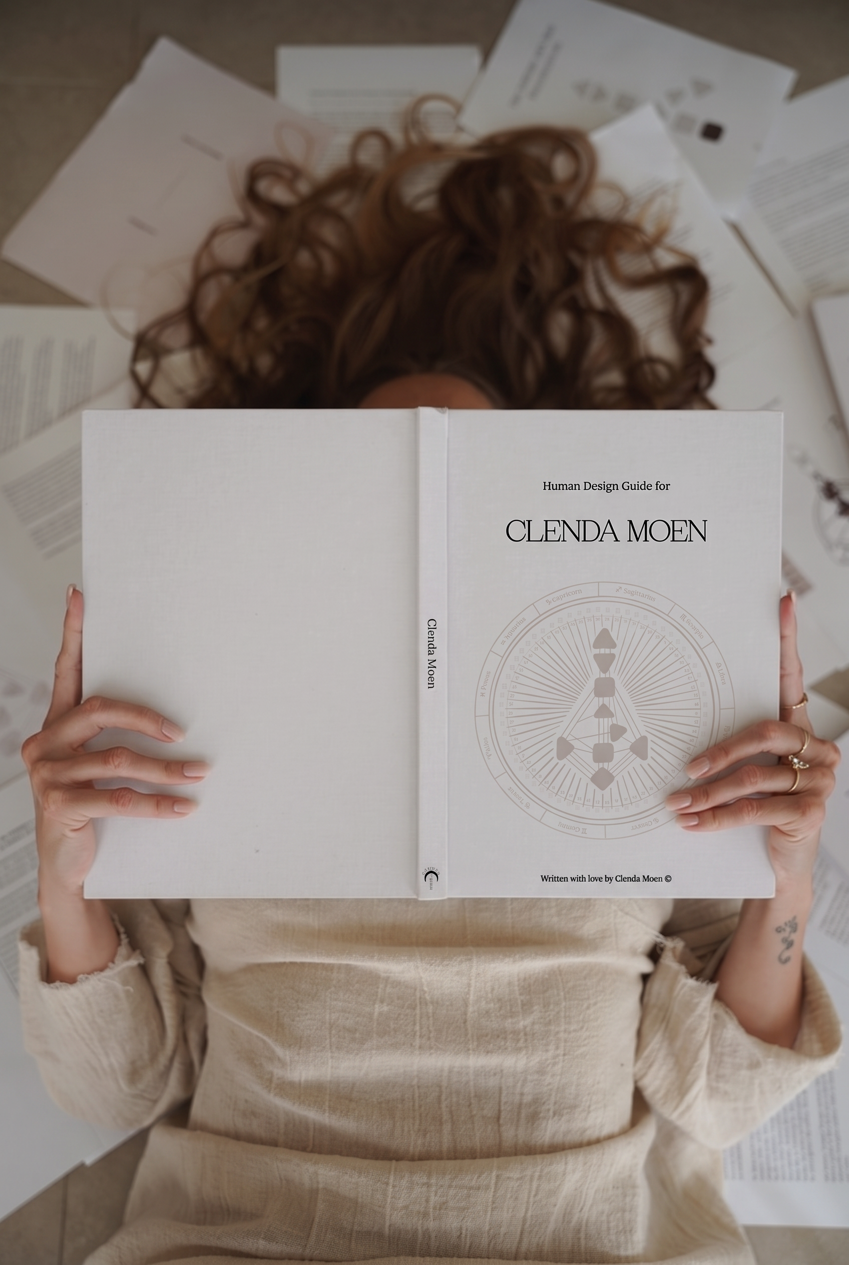 The personalized Human Design Guide, held open